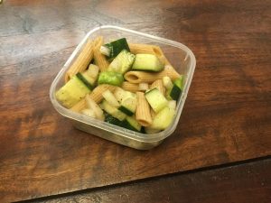 tossed salad in plastic container