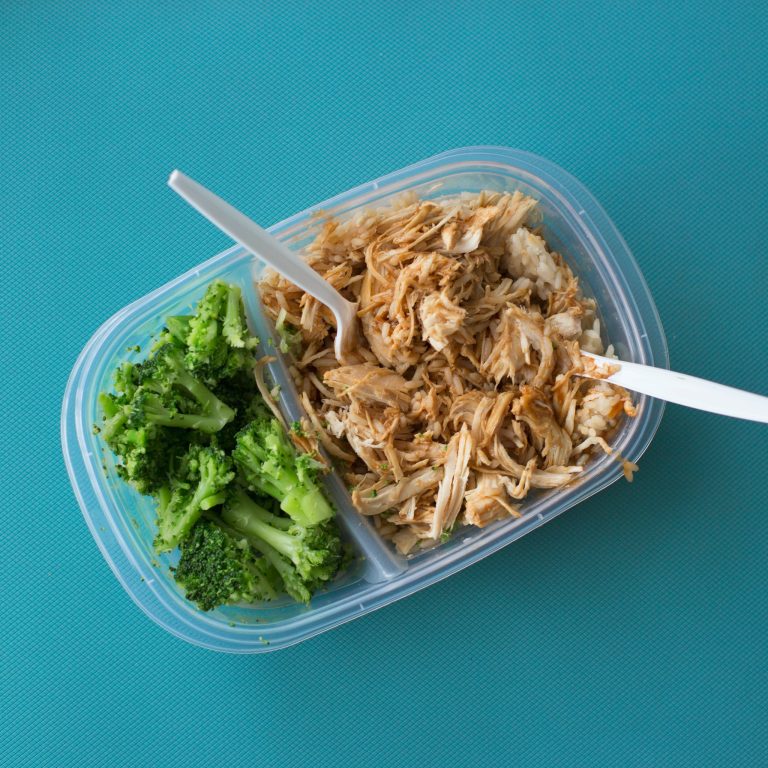 chicken and broccoli in plastic container