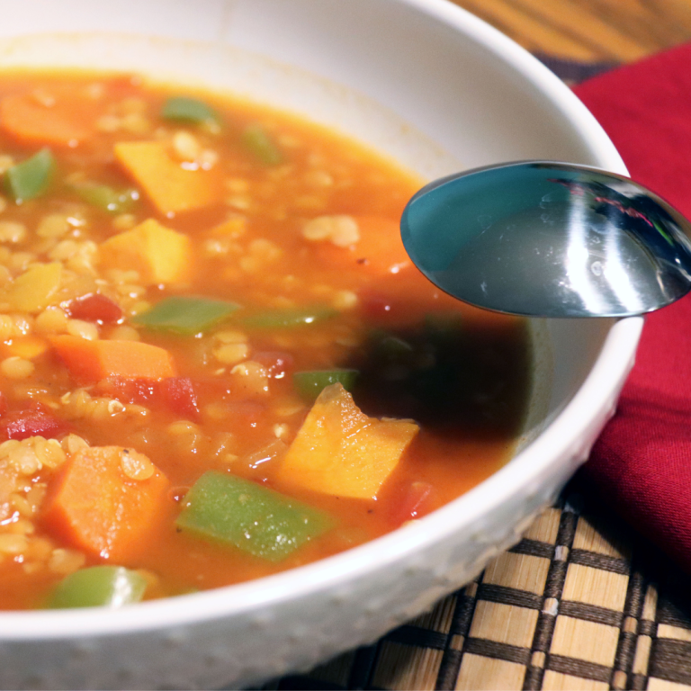 Bowl of lentil soup with vegetables