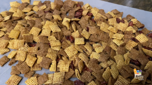 Cereal snack mix ingredients and Marty Moose smiling.