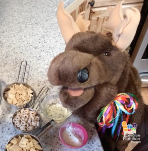cereal snack mix ingredients and Marty Moose smiling.