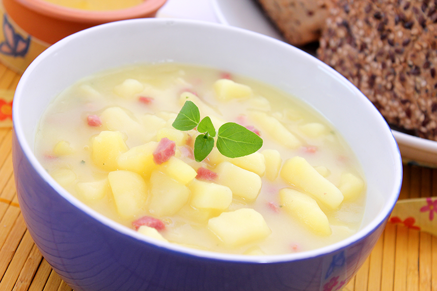 Ham and potato soup in bowl