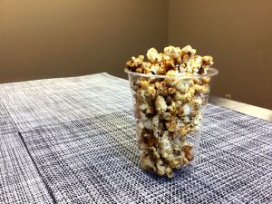 Cup of popped popcorn with spices