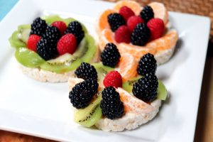 Rice cakes topped with yogurt and fruit