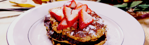 protein pancakes with strawberry topping on plate