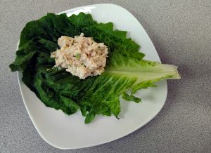 Chicken salad on a lettuce leaf