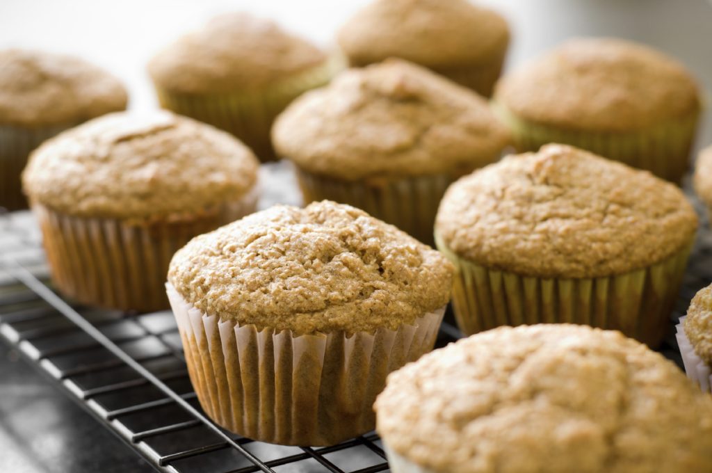 Cooling rack with muffins on it
