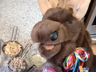 cereal snack mix ingredients and Marty Moose smiling.