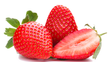 Three strawberries, one cut in half, on a white background